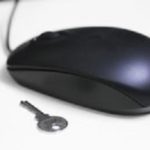 A computer mouse and a key